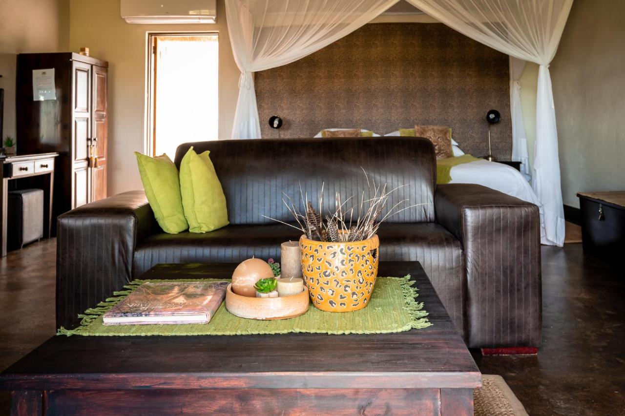 Umkumbe Safari Lodge Riverside Скукуза Экстерьер фото